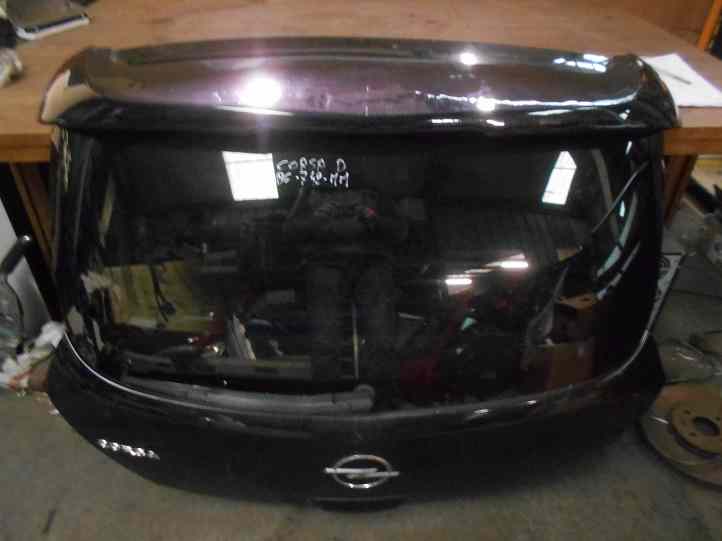 Hayon 
OPEL Corsa D
An 2011

Haut de casquette légèrement ondulée
Frais de Port sur devis