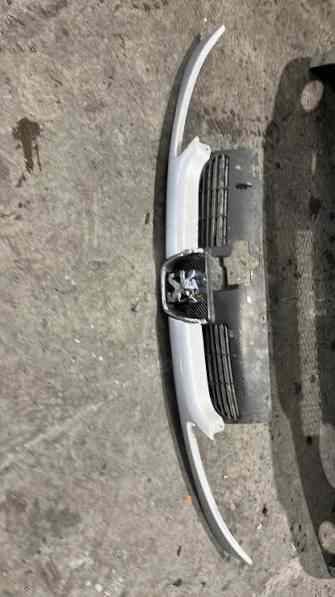 Calandre 
PEUGEOT 206

Frais de Port sur devis